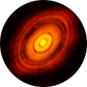 Concentric red and orange rings of varying widths surround a bright orange sphere.